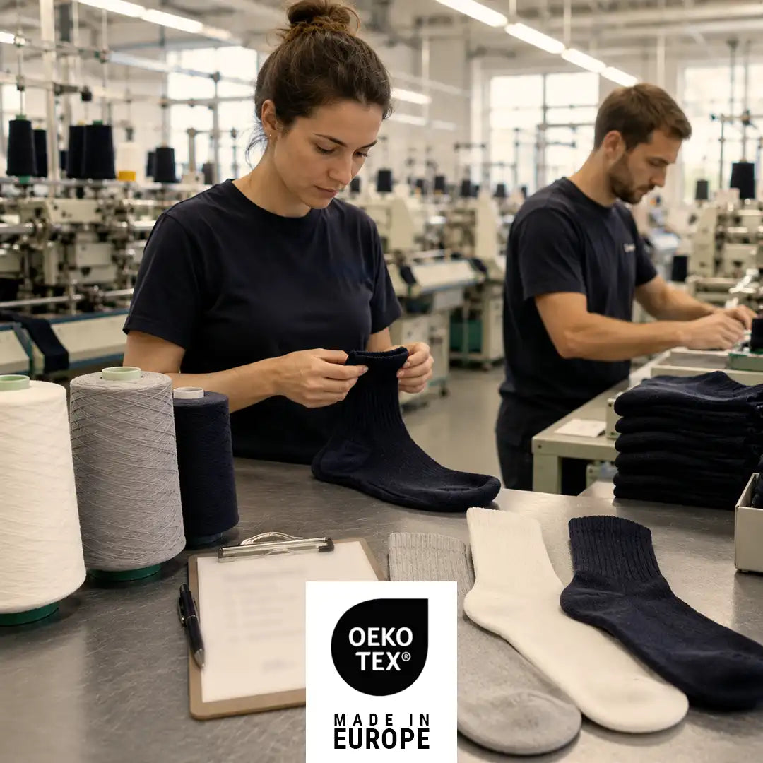 Mitarbeitende prüfen hochwertige Socken in moderner Textilproduktion in Europa – Qualitätskontrolle und Verarbeitung nach OEKO-TEX® STANDARD 100 für wyter.